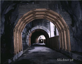 Mosier Twin Tunnels, viewed from within the tunnels, looking downhill towards the western entrance, which is gated. 